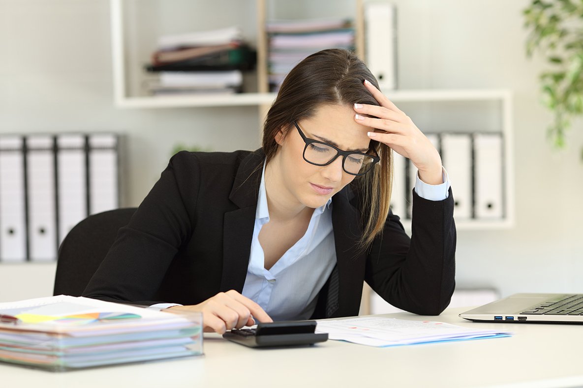 Woman who has a headache due to short-cycle rules